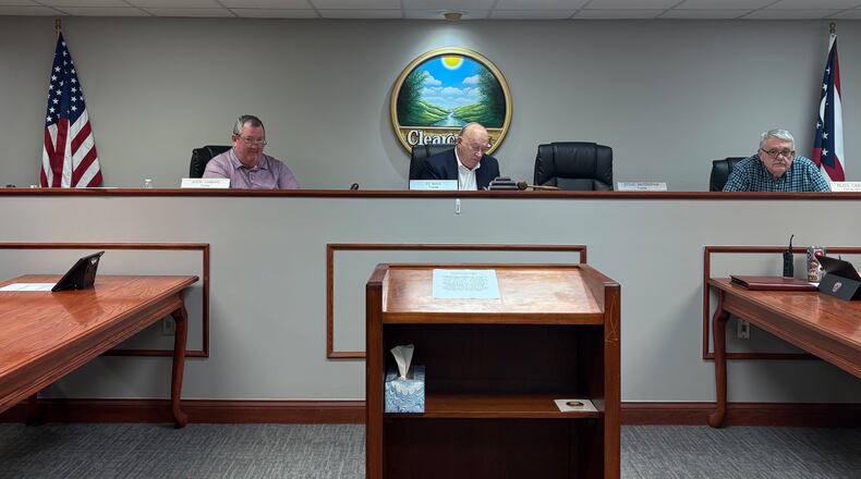 Clearcreek Twp. Trustees Jason Gabbard, left, and Ed Wade decide to table a vote on a proposed noise ordinance because Trustee Steve Muterspaw was not present for the Monday, April 14, 2025, meeting. At right is Fiscal Officer Russ Carolus. JEN BALDUF/STAFF