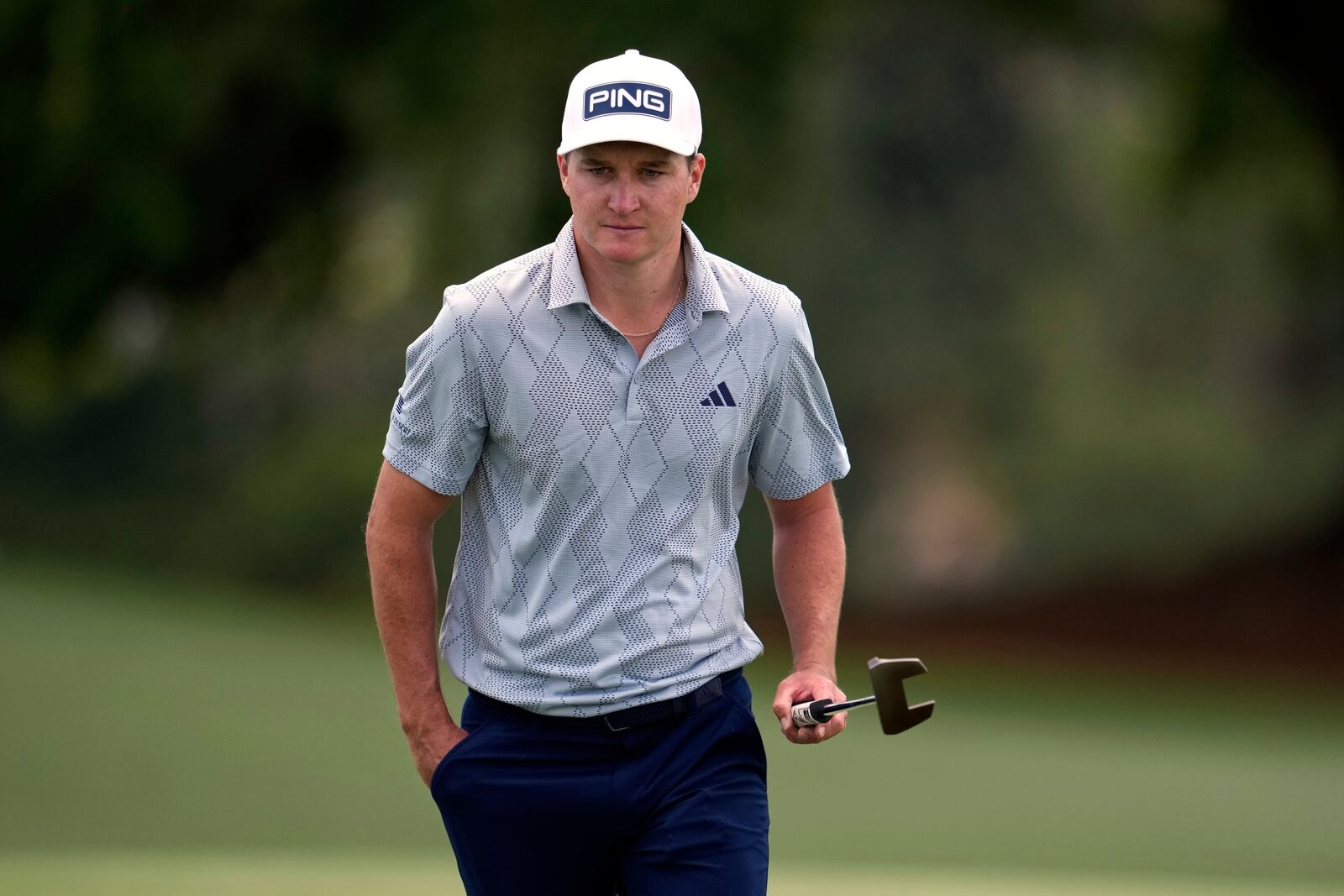 Matt McCarty walks to the green on the 18th hole during the second round at the Masters golf tournament, Friday, April 11, 2025, in Augusta, Ga. (AP Photo/George Walker IV)