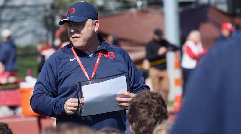 Dayton's Trevor Andrews talks to the team after the annual spring football game on Sunday, April 2, 2023, at the Jerry Von Mohr Practice Facility in Dayton. David Jablonski/Staff