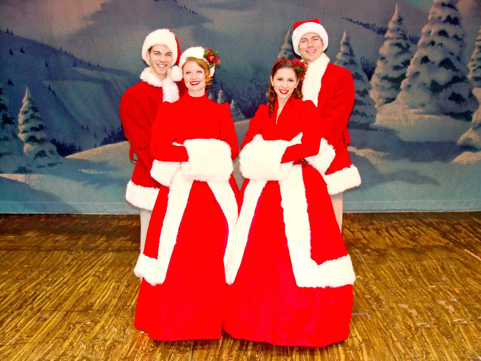 (left to right) Caleb Michael (Phil Davis), Marjie Shrimpton (Judy Haynes), Mica Dominguez-Robinson (Betty Haynes), and Austin Adomits (Bob Wallace) star in La Comedia Dinner Theatre’s production of Irving Berlin’s “White Christmas” through Dec. 31. CONTRIBUTED/JUSTIN WALTON