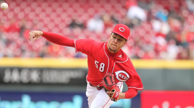 Reds starter Luis Castillo pitches against the Nationals on Saturday, March 31, 2018, at Great American Ball Park in Cincinnati. David Jablonski/Staff