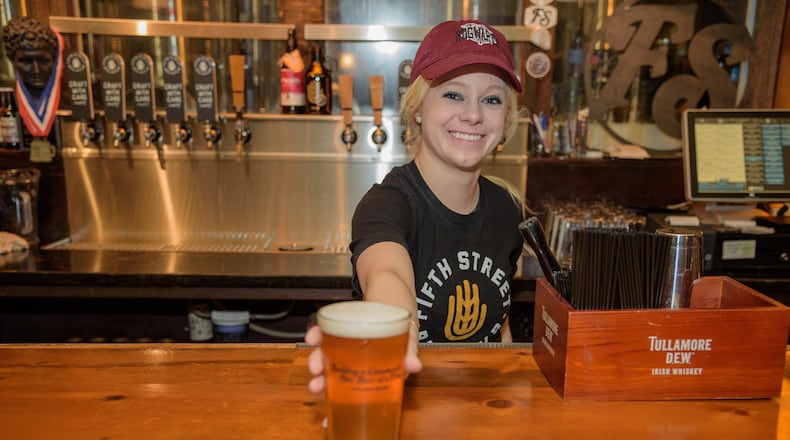 Fifth Street Brewpub teamed up with Dayton Sportcial to host a local Beer Olympics on Sunday, February 25, in conjunction with the closing ceremony for the 2018 Olympic Winter Games in Pyeong Chang. TOM GILLIAM PHOTOGRAPHY