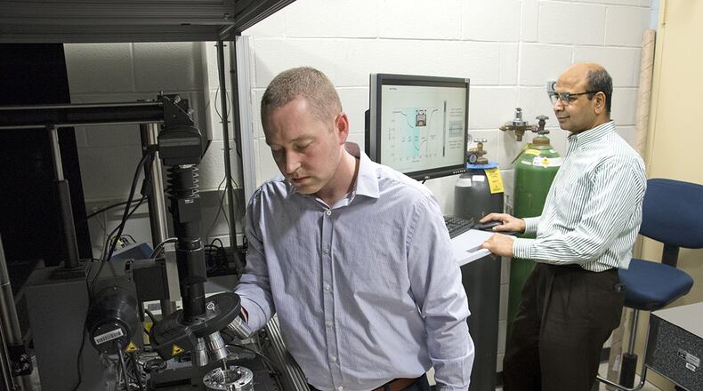 Researchers Dr. Nicholas Glavin (left) and Dr. Ajit Roy are working to develop flexible, wearable toxic agent detectors. (U.S. Air Force photo/Spencer Deer)