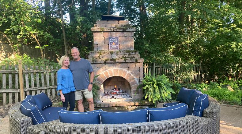 For the Millard family, the large stone fireplace hearth poolside has been the stage for countless evenings for 15 years. Contributed by Sarah Franks Fries