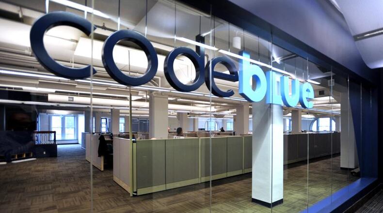CodeBlue, based in downtown Springfield, will be merged with another company. BILL LACKEY/STAFF