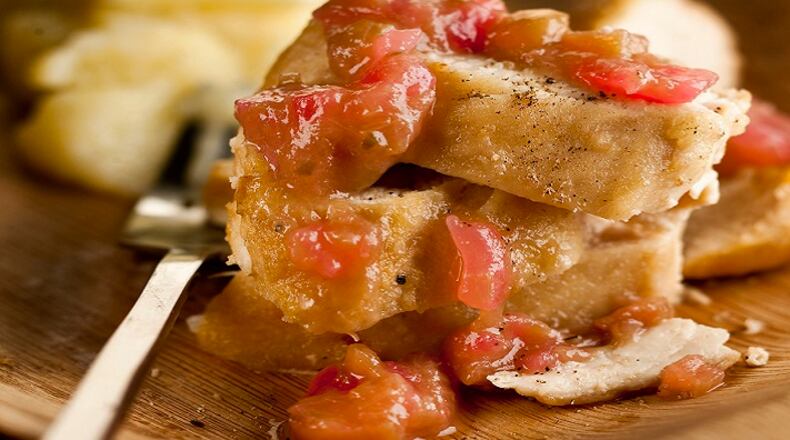 Fresh tart rhubarb is cooked briefly with onions and spicy pepper jelly to make a chutney for sauteed chicken. (Bill Hogan/Chicago Tribune/TNS)