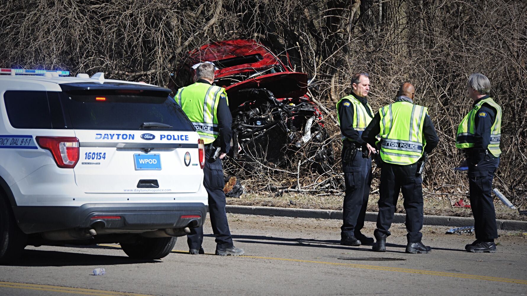 PHOTOS: Police crews respond to single-car crash in Dayton
