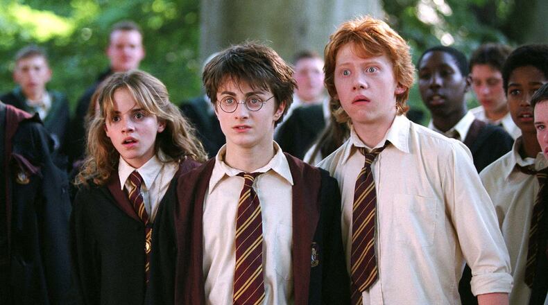In this image released by Warner Bros., from left, Emma Watson as Hermione Granger, Daniel Radcliffe as Harry Potter and Rupert Grint as Ron Weasley are shown in a scene from "Harry Potter and the Prisoner of Azkaban." (AP Photo/Warner Bros., Murray Close)