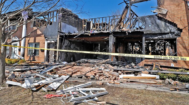 A section of the Ridgewood Court Townhomes that was blown apart in an April 8 explosion is shown Monday, April 10, 2023. BILL LACKEY/STAFF