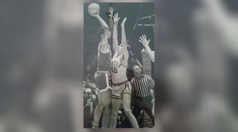 UCLA's Lew Alcindor, later known as Kareem Abdul-Jabbar, shoots over Dayton's Ned Sharpenter in the 1967 national title game. CONTRIBUTED PHOTO
