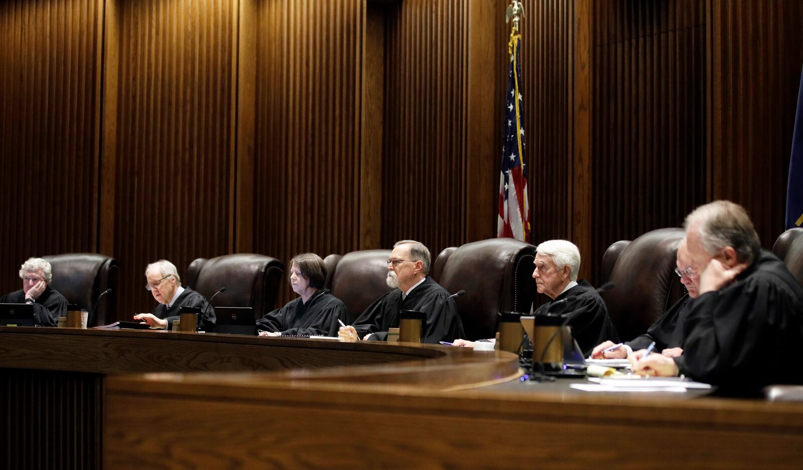 FILE - Justices listen to arguments during a school funding hearing before the Kansas Supreme Court in Topeka, Kan., May 22, 2018. (AP Photo/Orlin Wagner, Pool, File)