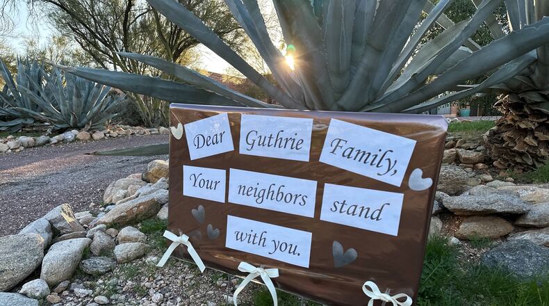 /// Neighbors of Nancy Guthrie, the daughter of "Today" host Savannah Guthrie, show support for the family in metro Tucson, Ariz., on Tuesday, Feb. 3, 2026, as the search continues to find Nancy who was reported missing. (AP Photo/Sejal Govindarao)