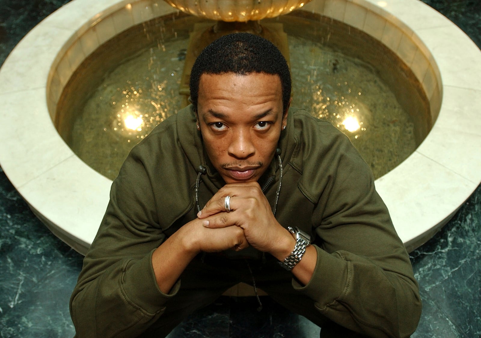 FILE - Dr. Dre poses for a photo at Le Meridien Hotel in Beverly Hills, Calif., on Nov. 12, 2001. (AP Photo/Chris Pizzello, File)