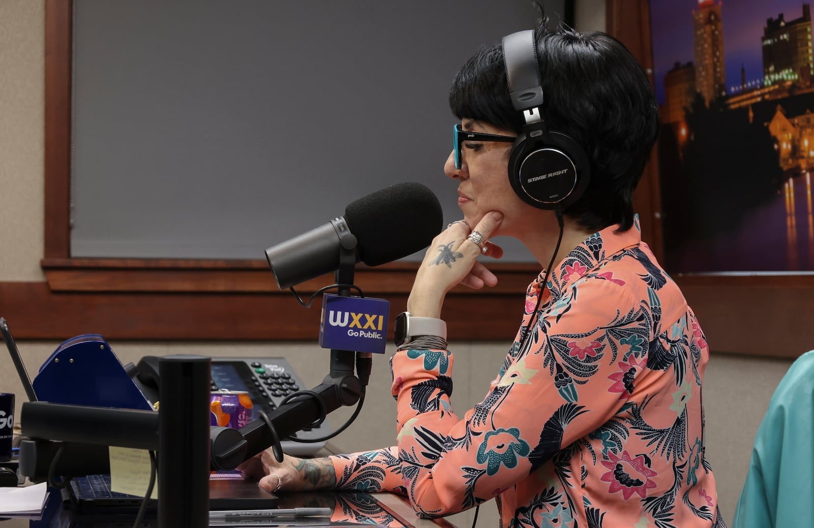 Jasmin Singer hosts her radio show, "Environmental Connections," on Friday, March 28, 2025, in Rochester, N.Y. (Toni Duncan via AP)
