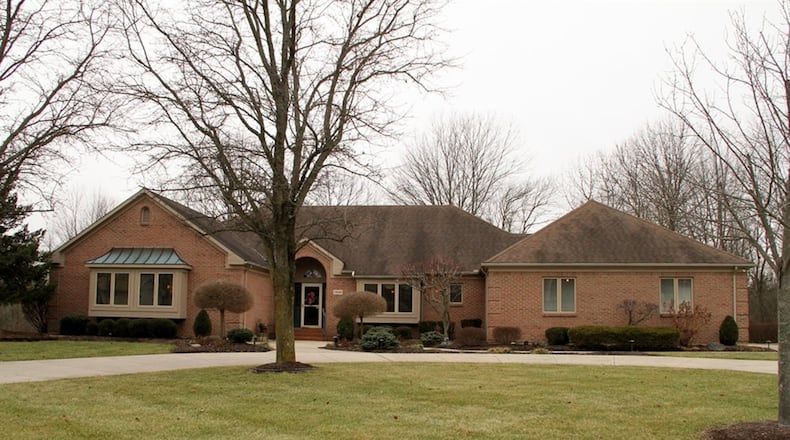 The 1-acre park-like property has the brick ranch house, concrete driveways and a 30-by-40-foot pole barn with concrete floor, electric, insulation, workbench, service door, 2 bay doors with 1 oversized for recreation vehicles. CONTRIBUTED PHOTOS BY KATHY TYLER
