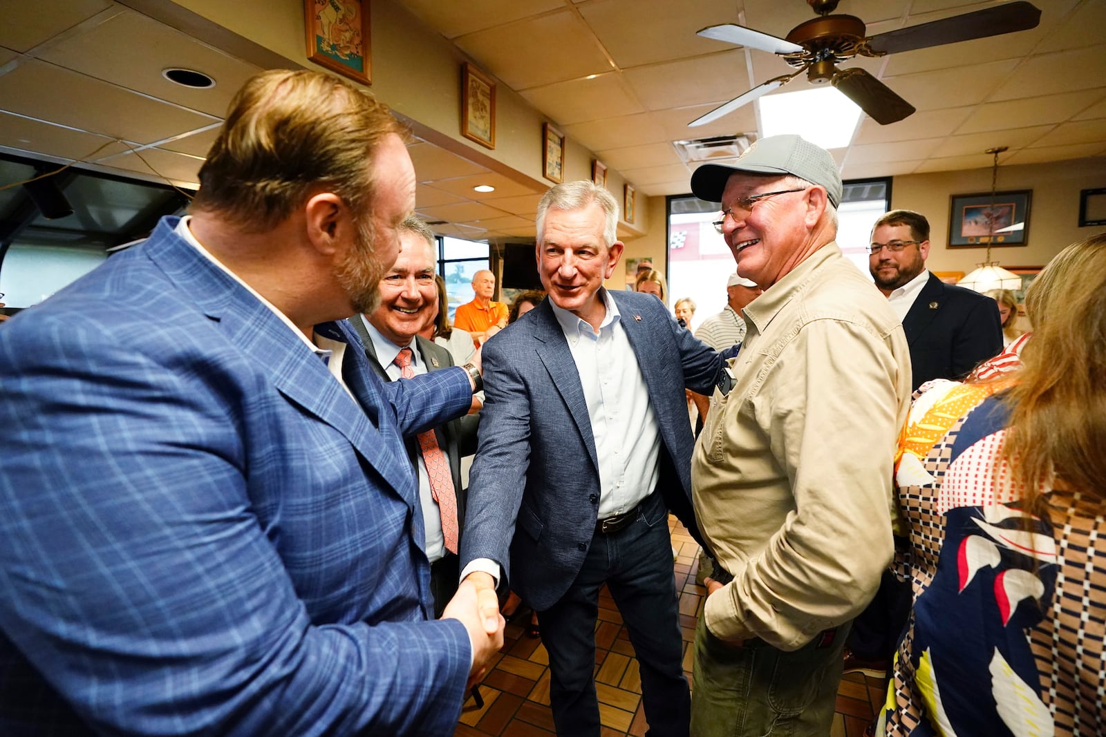 U.S. Sen. Tommy Tuberville, R-Ala., greets supporters following announcing his plans to run for the governor of Alabama in 2026, Tuesday May 27, 2025 at Byron's Smokehouse in Auburn, Ala. (AP Photo/ John David Mercer)