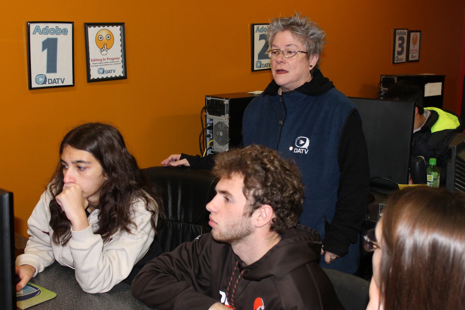 Rosemary Bradley, executive director of DATV, works with high school students. CONTRIBUTED PHOTO