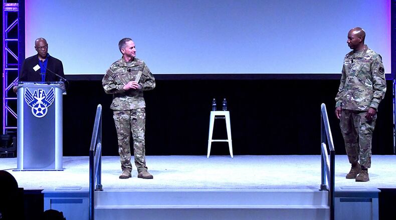 Air Force Chief of Staff Gen. David L. Golfein and Chief Master Sgt. of the Air Force Kaleth O. Wright speak during the Air Force Association’s Air Warfare Symposium in Orlando, Fla., March 1. During their remarks Goldfein and Wright highlighted the importance of inspirational and courageous leadership. (U.S. Air Force photo/Wayne Clark)