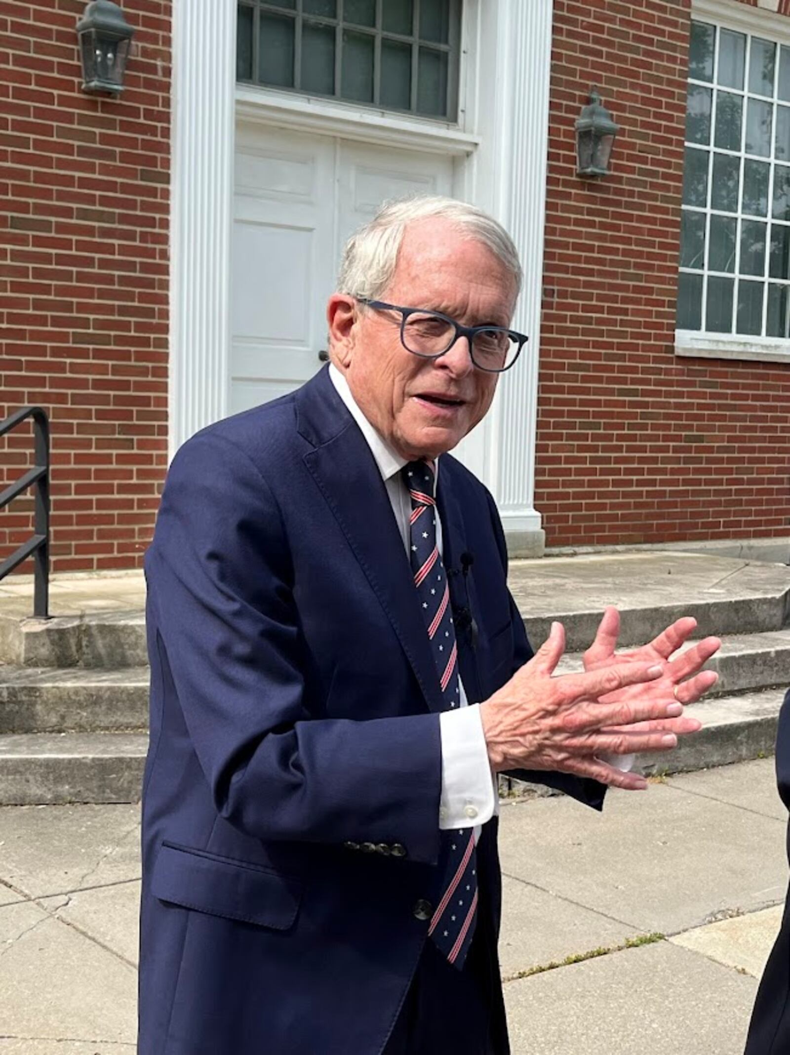 Gov. Mike DeWine, outside Wright Hall at Carillon Historical Park on Friday June 13, 2025. THOMAS GNAU/STAFF