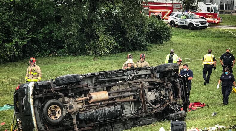 Crews responded to a rollover crash on U.S. 35 west near Germantown Street in Dayton on Tuesday, Aug. 18, 2020. STAFF PHOTO / JIM NOELKER