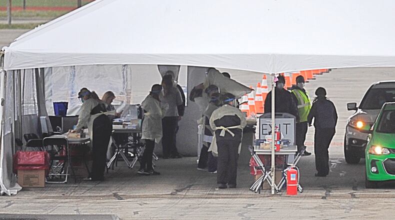 Drive-through testing for the Coronavirus at the University of Dayton Arena last week. MARSHALL GORBY\STAFF