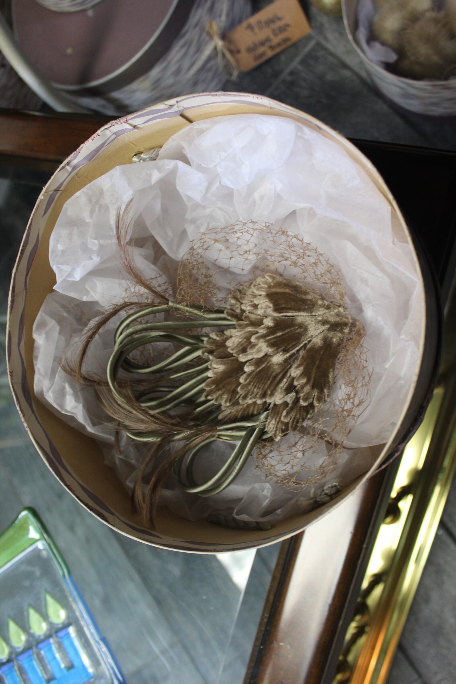 Vintage hats and hat boxes from from the former Rike’s Department store in downtown Dayton are being sold at The Flower Shoppe in Oakwood. Owner Mark Brueninghaus said the hats with a hat box range from about $45 to $95.
