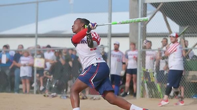 Former Notre Dame basketball standout Danielle Green, who scored over 1,000 career points and grabbed 500 rebounds, lost her left arm, just below the elbow, during a grenade attack in Iraq in 2004. CONTRIBUTED PHOTO