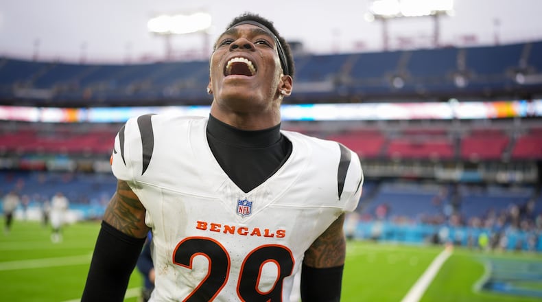 Cincinnati Bengals cornerback Cam Taylor-Britt (29) celebrates after an NFL football game against the Tennessee Titans, Sunday, Dec. 15, 2024, in Nashville, Tenn. The Bengals won 37-27. (AP Photo/George Walker IV)