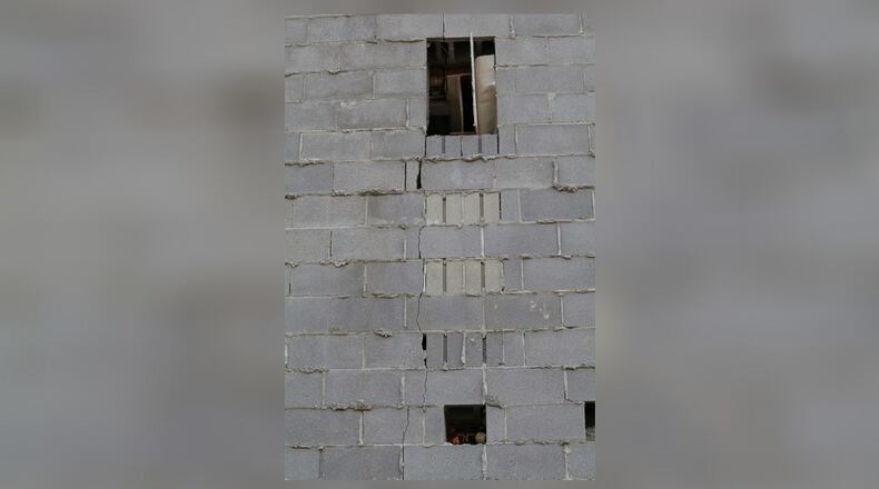 Blue Rock Investments LLC and Boymel Family LLC have filed a lawsuit against the city of Xenia in connection to the demolition of the old Kmart building, which the suit alleges led to damage to the adjacent former Fulmer’s store. Contributed photo