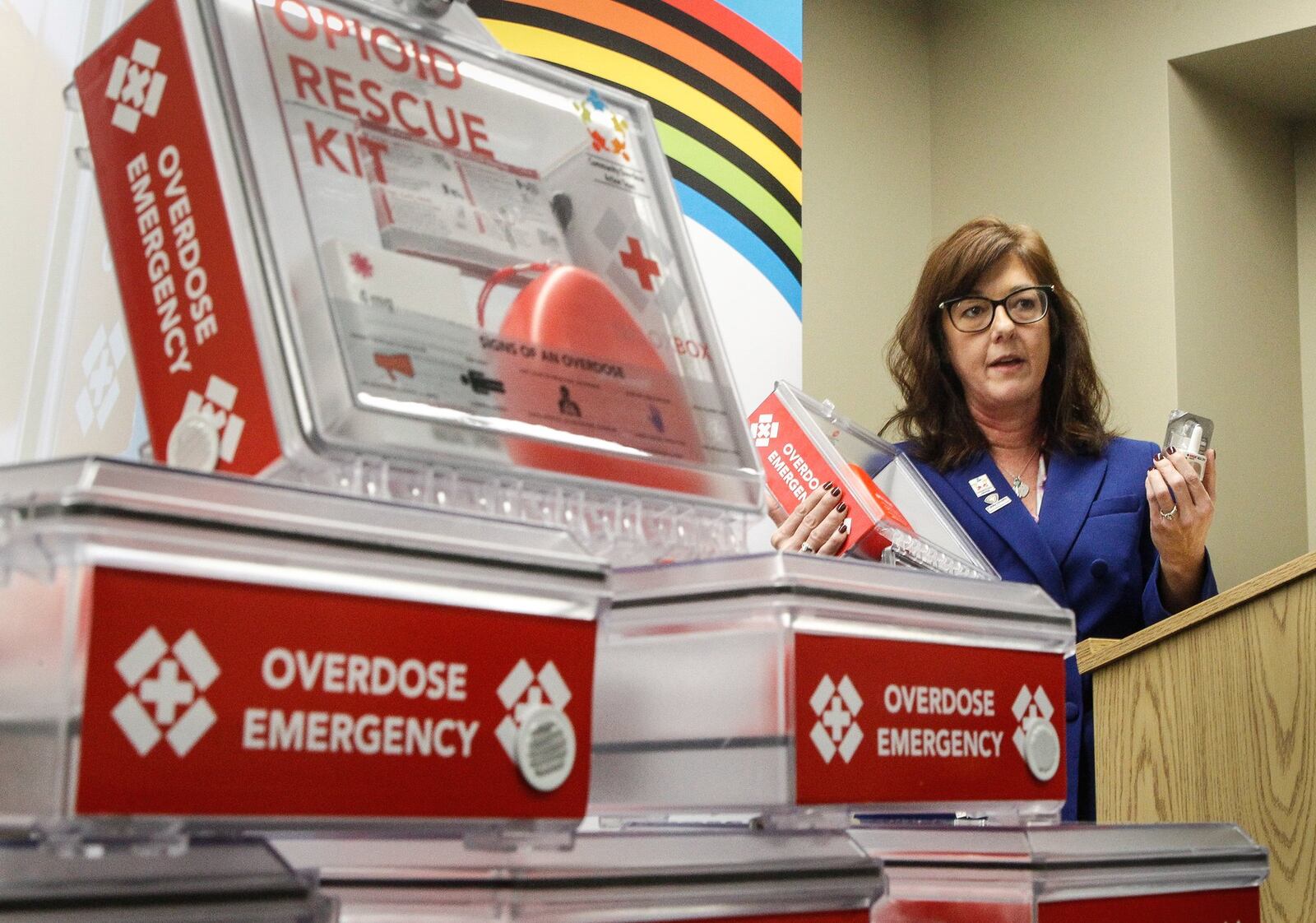 Barbara Marsh, Assistant to the Health Commissioner, Public Health -- Dayton & Montgomery County, shows new opioid rescue kits containing naloxone that will be given free to Montgomery County businesses that request them. CHRIS STEWART / STAFF