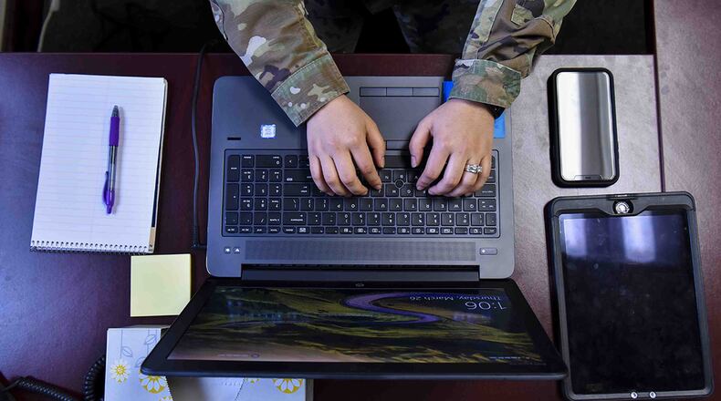 Telework capabilities are expanding offering relief for Wright-Patterson Air Force Base personnel who are currently working from home due to COVID-19. Commercial Virtual Remote environment allows users to access versions of Microsoft Teams, SharePoint online, OneDrive and Skype without Virtual Private Network connection. In addition, the number of VPN connections are increasing to total over 200,000 with the potential to reach 380,000. (U.S. Air Force photo/Airman 1st Class Kiaundra Miller)