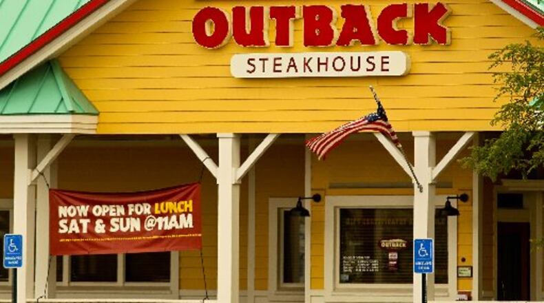 An Outback Steakhouse is planned for space at the Dayton Mall formerly occupied by the Sears Auto Center, according to Miami Twp. officials. FILE PHOTO