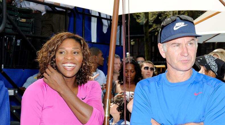 NEW YORK - AUGUST 26: Serena Williams looks on with John McEnroe before their match at the DIRECTV ESPN US Open Experience promoting DIRECTV’s mosaic coverage of the US Open August 26, 2009 at Bryant Park in New York Cty. (Rob Tringali/Getty Images for DirecTV)