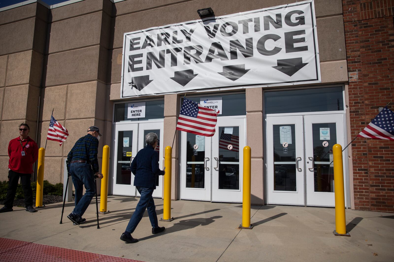 People arrive to vote early at the Franklin County Board of Elections in Columbus, Ohio, on Oct. 14, 2022. Days into early voting in the 2022 midterm elections, states across the country have seen a surge of voters casting ballots at in-person voting sites and by mail, the latest sign that the 2020 election ushered in a transformation in the way Americans vote. (Maddie McGarvey/The New York Times)