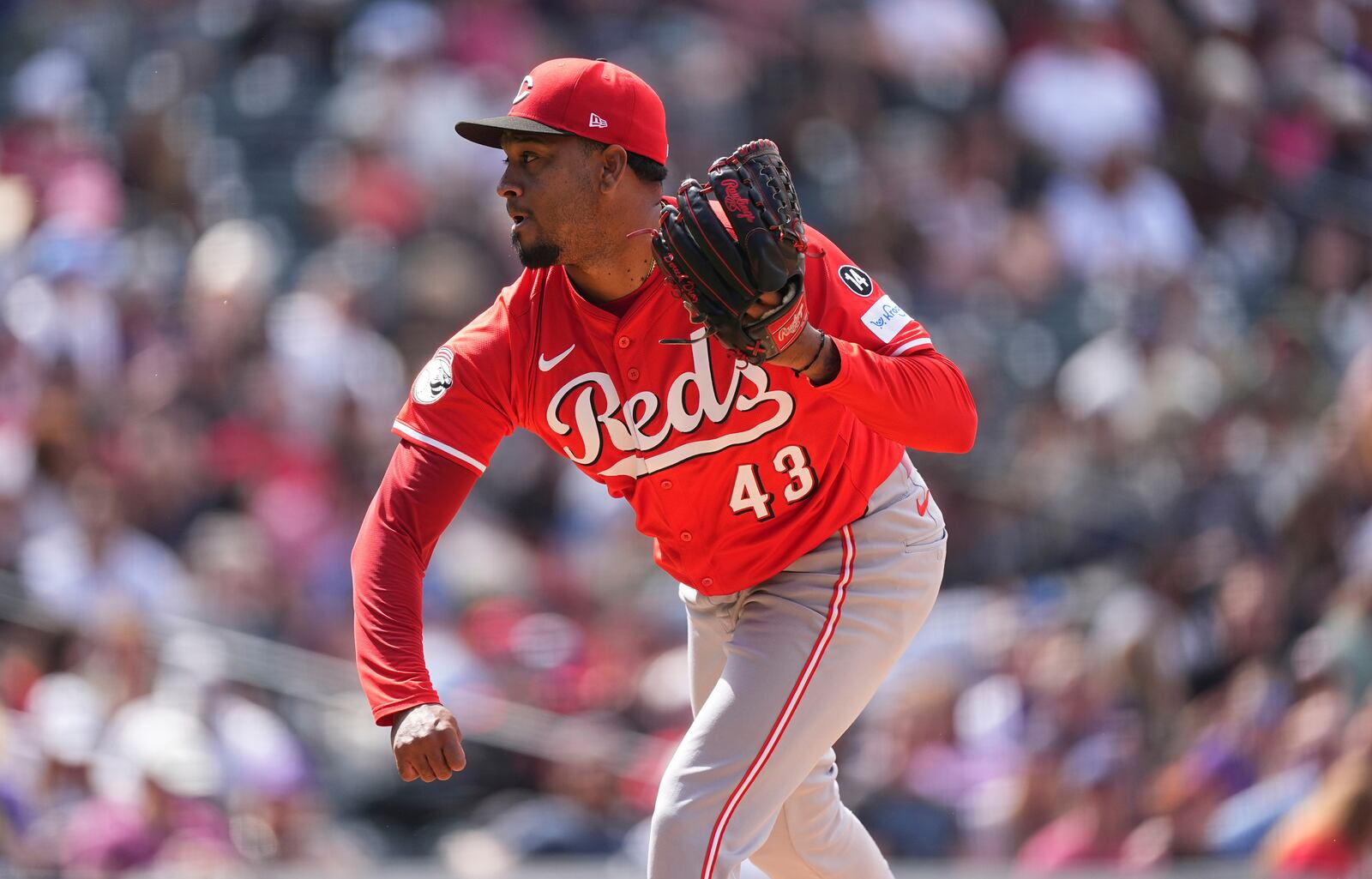 Cincinnati Reds relief pitcher Alexis Díaz works against the Colorado Rockies in the eighth inning of a baseball game Saturday, April 26, 2025, in Denver. (AP Photo/David Zalubowski)