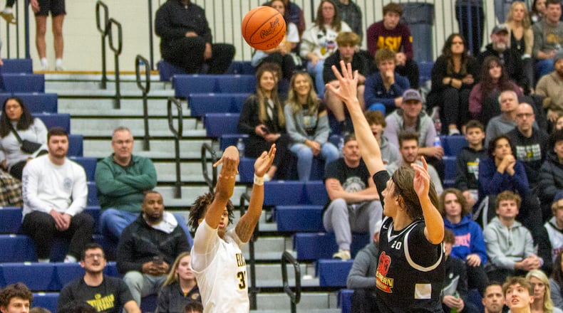 Centerville's Jonathan Powell shoots the third 3-pointer he made in the fourth quarter Sunday night to help Centerville defeat SoCal Academy at Trent Arena. Powell scored 13 of his 22 points in the fourth. CONTRIBUTED/Jeff Gilbert