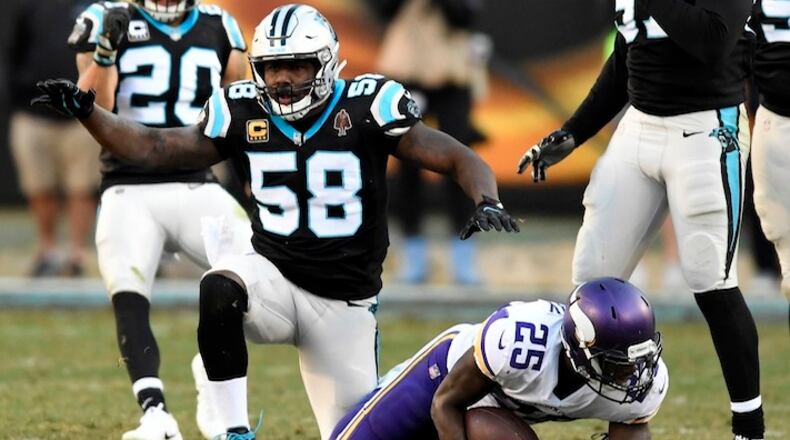 Carolina Panthers outside linebacker Thomas Davis (58) celebrates his tackle of Minnesota Vikings running back Latavius Murray (25) on Sunday, Dec. 10, 2017 at Bank of America Stadium in Charlotte, N.C. The Panthers won 31-24. (David T. Foster III/Charlotte Observer/TNS)