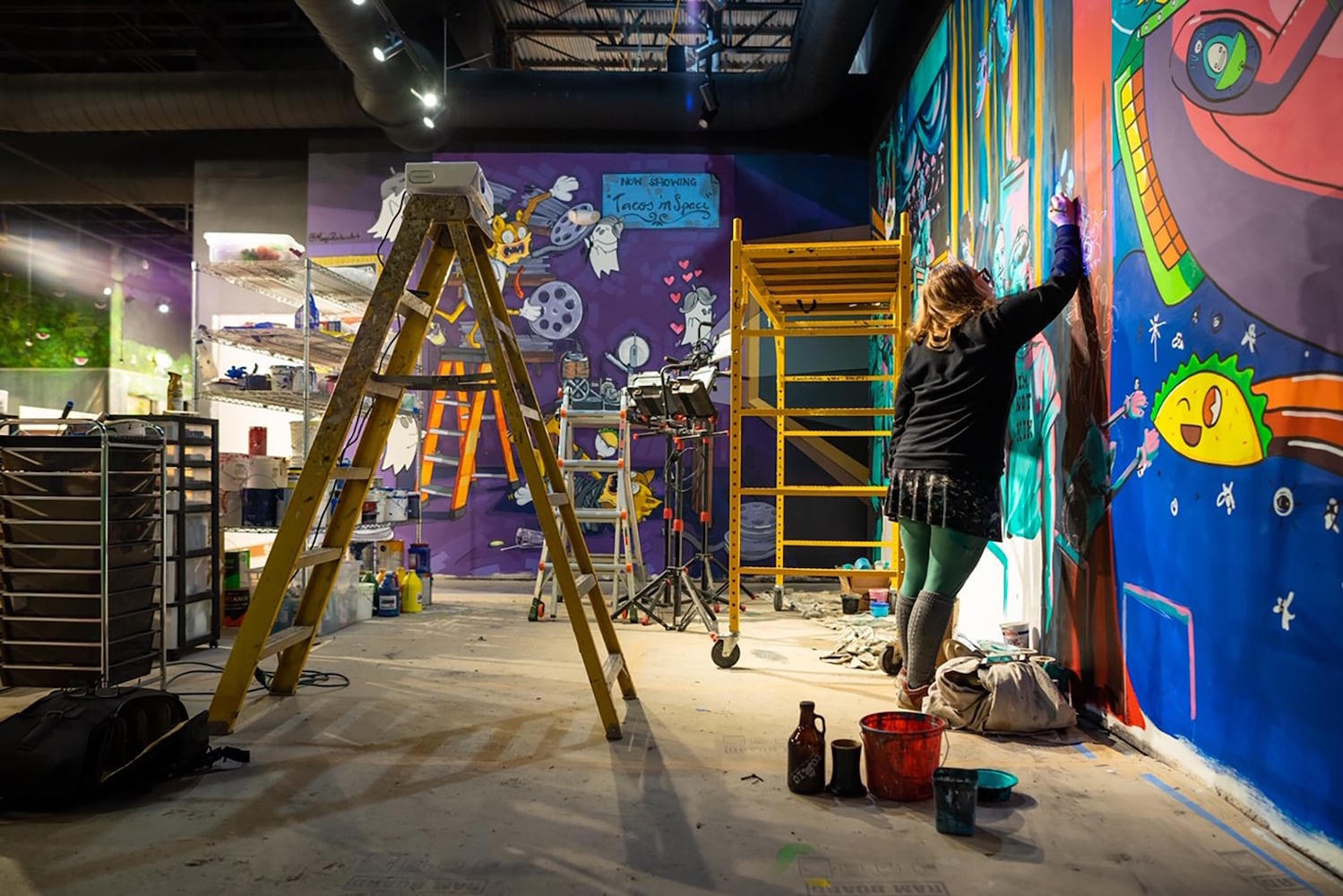 PHOTOS: Wild and wacky murals take over new restaurant at The Greene
