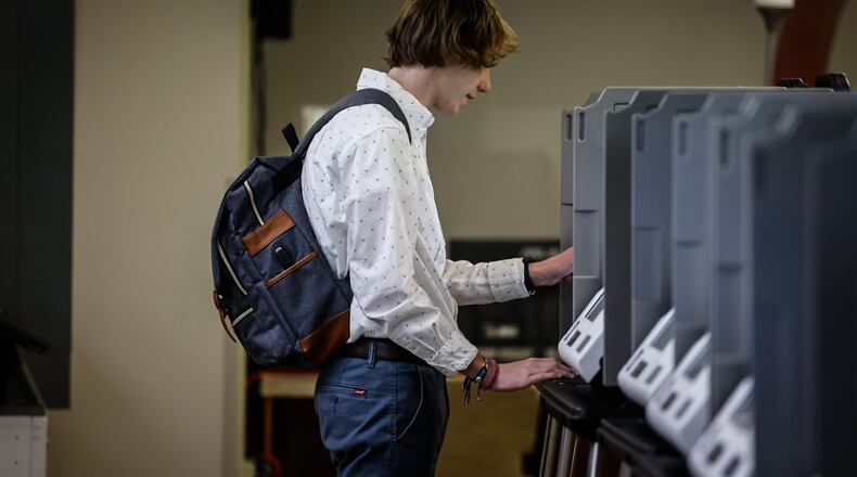 Kyle Bucklew votes early at Montgomery County Board of Elections Thursday  March 14, 2024. JIM NOELKER/STAFF