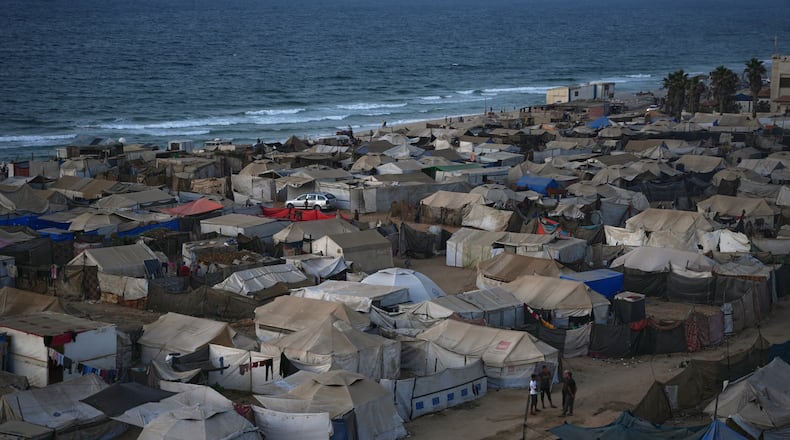 Tents fill a makeshift camp for displaced Palestinians in Zawaida, in the central Gaza Strip, on Saturday, Nov. 1, 2025. (AP Photo/Abdel Kareem Hana)