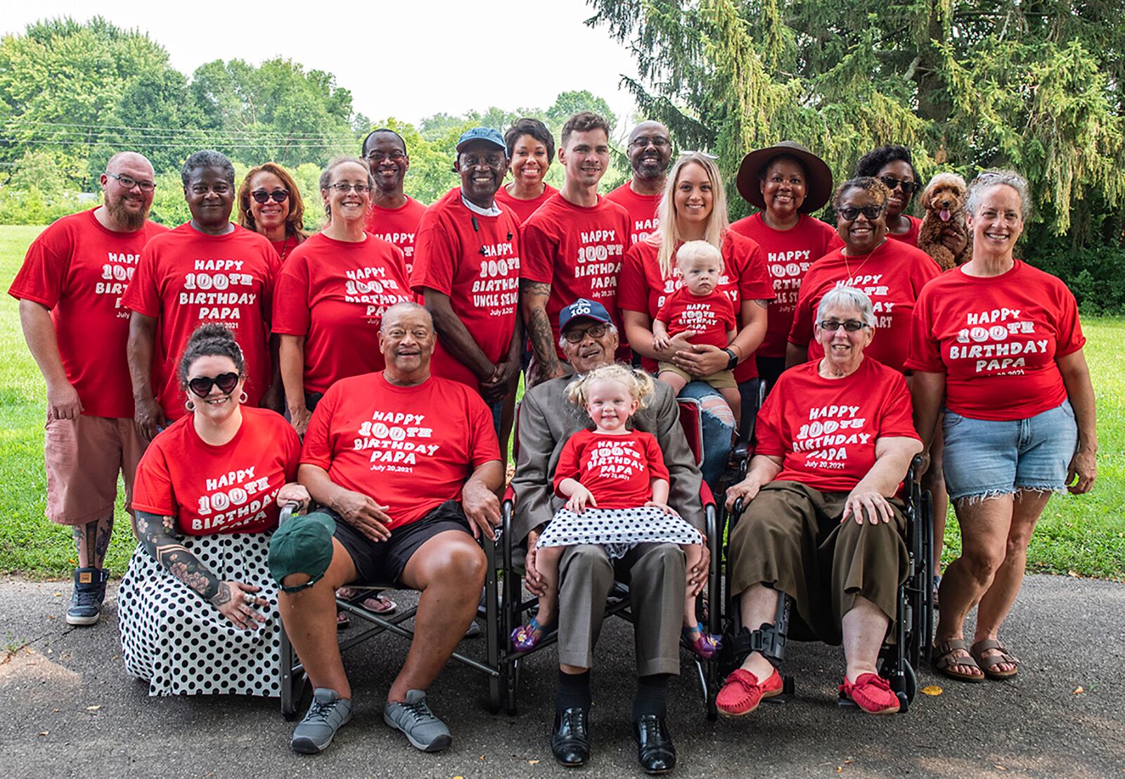 Willie Parker, an Air Force veteran who served during World War II and the Korean conflict, poses with family members during his 100th birthday celebration July 20 at Thomas A. Cloud Park in Huber Heights. U.S. AIR FORCE PHOTO/WESLEY FARNSWORTH