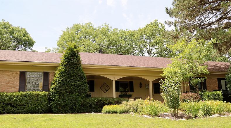 Tucked off a cul-de-sac among a park-like surrounding, the ranch has about 4,000 sq. ft. of living space, including the lower level, which has a recreation room, game room and family room. The home has a side-entry, 2-car garage. CONTRIBUTED PHOTO BY KATHY TYLER