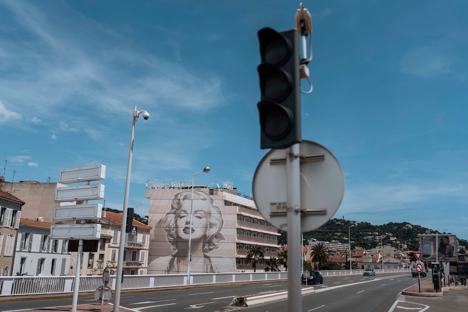 Traffic lights are switched off during an electricity outage in Cannes, southern France, Saturday, May 24, 2025. (AP Photo/Lewis Joly)