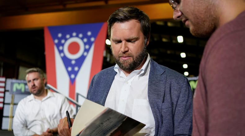 JD Vance, the venture capitalist and author of "Hillbilly Elegy", speaks with supporters following a rally Thursday, July 1, 2021, in Middletown, Ohio, where he announced he is joining the crowded Republican race for the Ohio U.S. Senate seat being left by Rob Portman. (AP Photo/Jeff Dean)