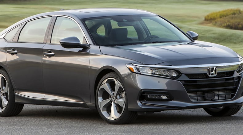 The 10th-generation Honda Accord edged out the Kia Stinger and Toyota Camry to be named, which was announced at the North American International Auto Show Jan. 15 in Detroit. Here is the 2018 Honda Accord Touring 2.0T. Honda photo