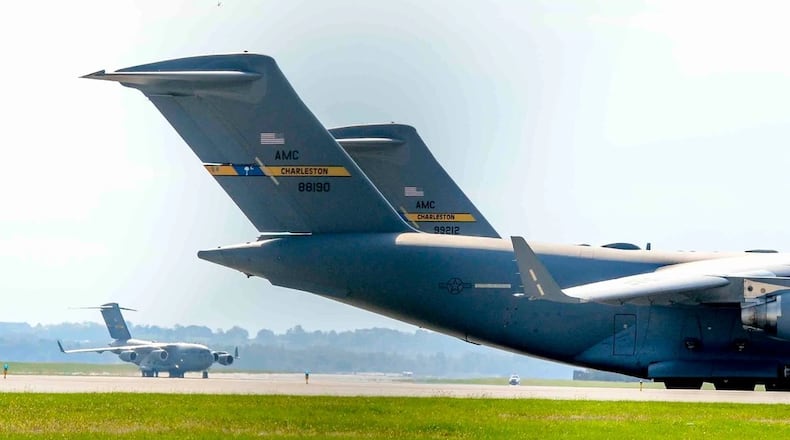 A C-17 Globemaster III from Joint Base Charleston, S.C, taxis on the runway at Wright-Patterson Air Force Base, Oct. 5, 2016. The C-17 was one of several planes using Wright-Patterson as a safe haven while Hurricane Matthew threatens their home station. (U.S. Air Force photo by Wesley Farnsworth)