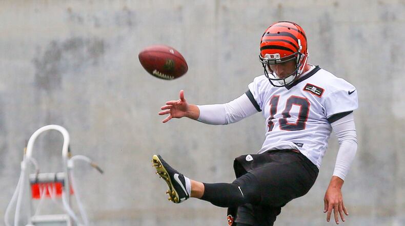 Bengals punter Kevin Huber (10) participates in a team practice at Paul Brown Stadium, Tuesday, June 13, 2017. GREG LYNCH / STAFF