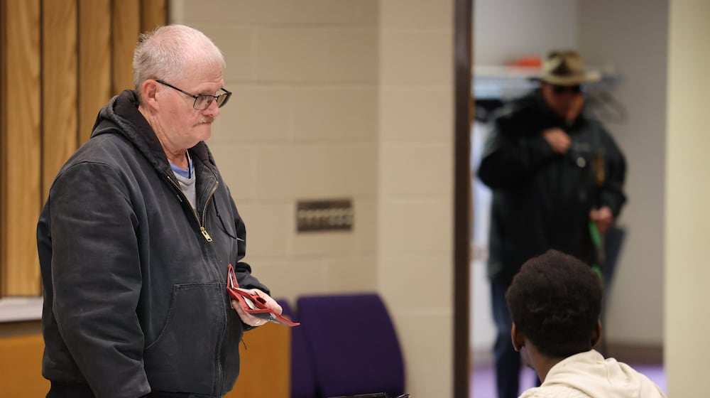 Voters sign in at a polling location at New Season Ministry on Tuesday, Nov. 4 in Huber Heights. Poll workers said at around 11 a.m. turnout was slightly lower than normal compared to similar cycles. Huber Heights voters did not have many contested races and decided on one issue, a renewal Montgomery County property tax. BRYANT BILLING/STAFF