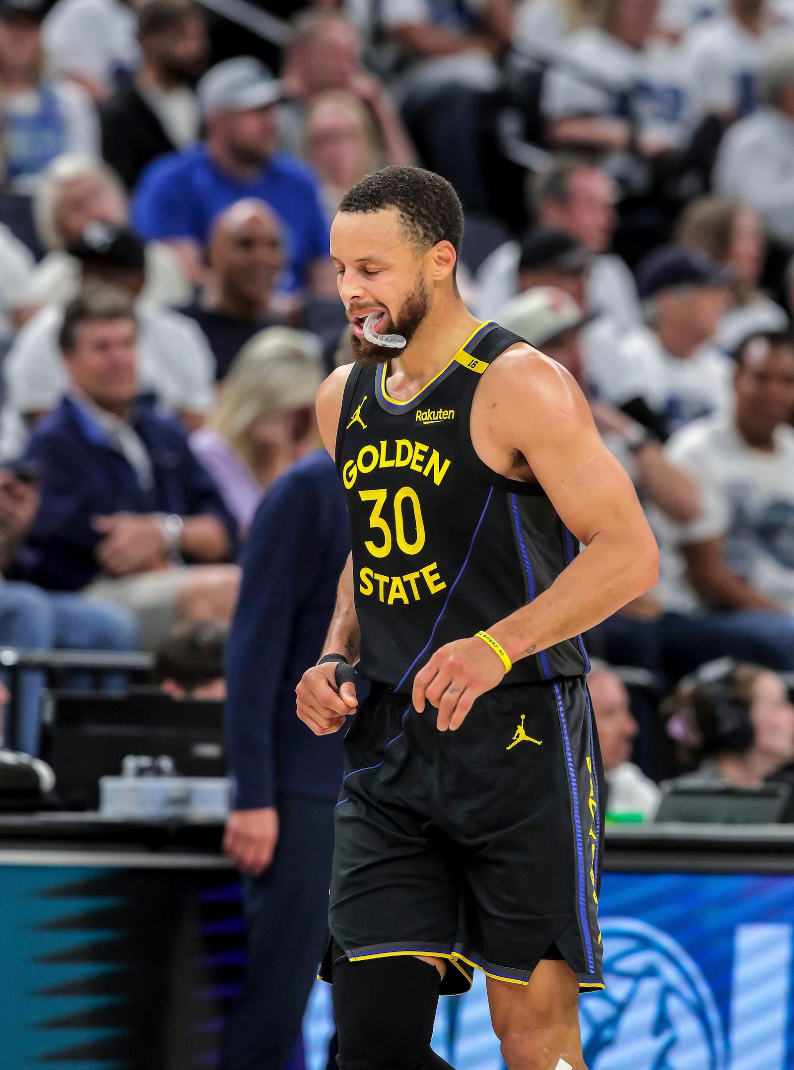 Stephen Curry (30) heads back to the bench in the first half as the Golden State Warriors played the Minnesota Timberwolves in Game 1 of the Second Round of the NBA Playoffs at Target Center in Minneapolis, Minn., on Tuesday, May 6, 2025. ( Carlos Avila Gonzalez/San Francisco Chronicle via AP)