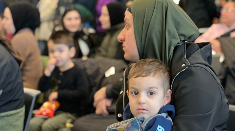 Ukrainian citizens were welcomed to Dayton, and America, during an event Saturday at the Dayton Metro Library's main campus. AIMEE HANCOCK/STAFF